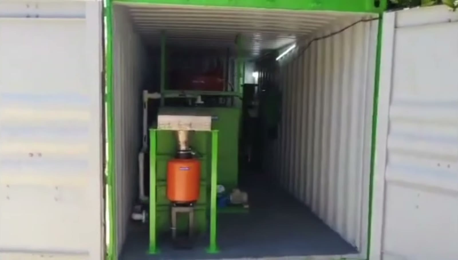 Open container doors showing the complete plant inside